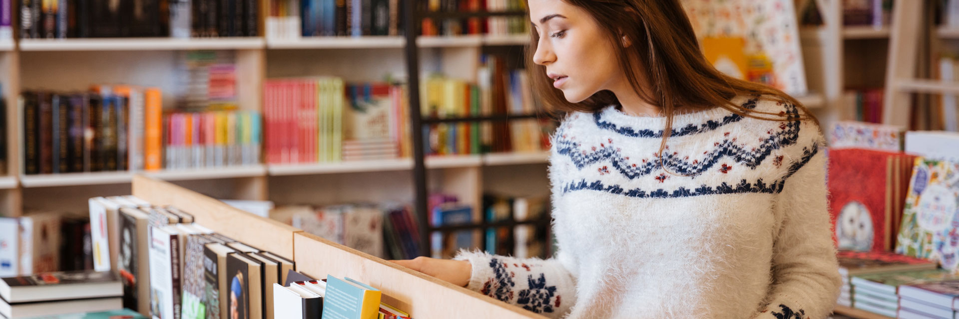 woman browsing in a bookstore